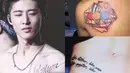 B.I iKON mempunyai beberapa tato di tubuhnya. Di pinggangnya terdapat tato bertulisan 'Like father, like son, like master, like man'. Di dada terdapat Nihilism. (Foto: koreaboo.com)