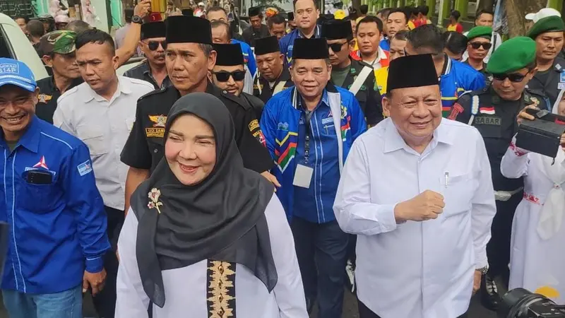 Pasangan calon Wali Kota dan Wakil Wali Kota Bandar Lampung, Eva Dwiana - Deddy Amurullah. Foto : (Liputan6.com/Ardi).