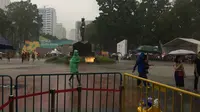Kawasan GBK Diguyur Hujan, Pengunjung Asian Games Berlarian