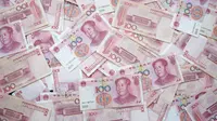 Ilustrasi mata uang yuan China. (dok. Eric Prouzet/Unsplash)