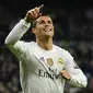 Pemain Real Madrid, Cristiano Ronaldo saat mencetak Quattrick (4 gol)  ke gawang Malmo FF di Stadion  Santiago Bernabeu, Madrid, Rabu (9/12/2015). (AFP Photo/Pierre-Philippe Marcou)