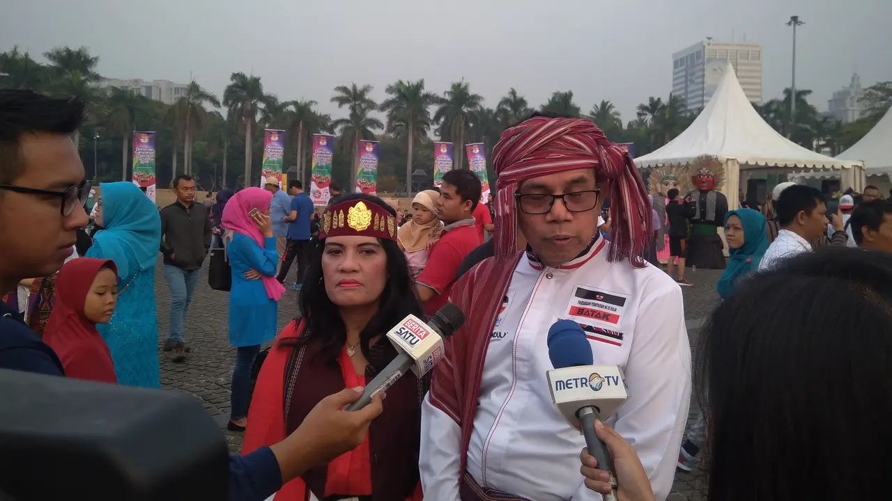 Sekjen Partai Demokrat Hinca Panjaitan mengikuti Kampanye Damai yang digelar Koisi Pemilihan Umum di Lapangan Monas, Jakarta. (Merdeka.com/Muhammad Genantan Saputra)