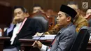 Saksi dari tim hukum Jokowi-Ma'ruf, Anas Nashikin saat bersaksi dalam sidang sengketa Pilpres 2019 di Gedung MK, Jakarta, Jumat (21/6/2019). Sidang tersebut beragendakan mendengar keterangan saksi dan ahli dari pihak terkait yakni paslon nomor urut 01 Jokowi-Ma'ruf Amin. (Liputan6.com/Johan Tallo)