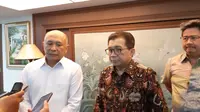 Menteri Koperasi dan UKM Teten Masduki dan Dubes Republik Indonesia untuk Konfederasi Swiss Muliaman Hadad. Dok: Tommy Kurnia/Liputan6.com