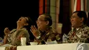 Susi Pudjiastuti tertawa lepas pada Rapimnas yang bertema "Mengembalikan Kejayaan Ekonomi Maritim untuk Kesejahteraan Rakyat", Jakarta, Senin (8/12/2014). (Liputan6.com/Faizal Fanani)
