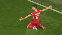 Selebrasi striker Timnas Turki, Arda Guler setelah mencetak gol kedua timnya ke gawang Timnas Georgia pada laga matchday pertama Grup F Euro 2024 di Westfalenstadion, Dortmund, Jerman, Selasa (18/6/2024). (AP Photo/Andreea Alexandru)
