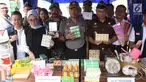 Kepala BPOM RI Penny K Lukito menunjukkan barang bukti kosmetik palsu di kawasan Tambora, Jakarta Barat, Selasa (15/5). Petugas menemukan 21 item produk jadi kosmetik ilegal, bahan baku, dan alat produksi. (Liputan6.com/Arya Manggala)