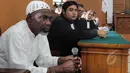 Martin Anderson alias Belo (kiri) mengikuti sidang peninjauan kembali (PK) di PN Jakarta Selatan, Kamis (19/3/2015). Belo mengajukan PK terkait vonis hukuman mati karena terbukti membawa narkoba jenis heroin seberat 50 gram. (Liputan6.com/Johan Tallo)