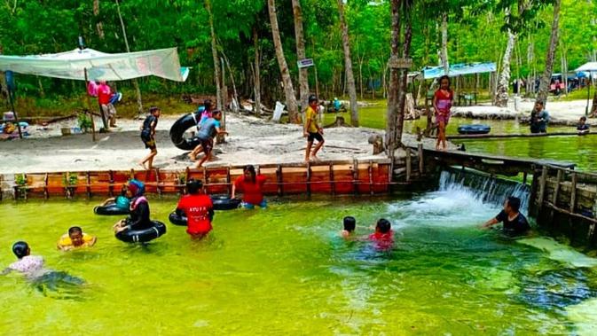 Objek Wisata Sungai Hijau di Kabupaten Kampar ketika masih buka sebelum pandemi Covid-19. (Liputan6.com/Istimewa)