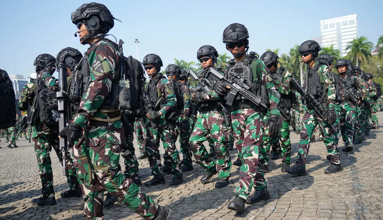 Ring 1 akan melekat kepada para VVIP, yaitu presiden dan wakil presiden serta tamu negara. Ring 2 di lokasi acara pelantikan, dan Ring 3 akan ditempatkan di luar dan sekitar lokasi pelantikan. (AP Photo/Tatan Syuflana)
