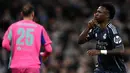 Menit ke-22, melalui eksekusi tendangan penalti, penyerang Real Madrid asal Brasil, Vinicius Junior membawa Los Blancos unggul 1-0. Tampak dalam foto, penyerang Real Madrid asal Brasil, Vinicius Junior, merayakan golnya pada pertandingan leg kedua 16 besar Liga Champions 2025/2026 melawan Manchester City di Etihad Stadium, barat laut Inggris, pada Selasa 17 Maret 2026 waktu setempat atau Rabu (18/3) dini hari WIB. (Paul ELLIS/AFP)