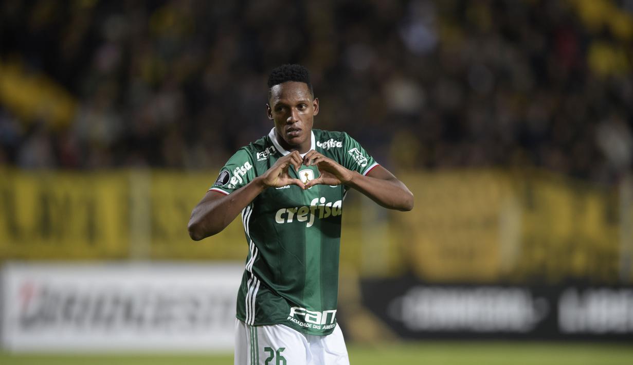 Barcelona mengikat pemain asal Brasil yang bermain untuk klub Palmeiras, Yerry Mina sebesar 10.5 juta pound sterling untuk menambal lini belakang tim asal Catalan tersebut. (AFP/Miguel Rojo)