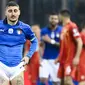 Timnas Italia harus menelan pil pahit usai dipastikan gagal tampil di final Piala Dunia di Qatar. (AFP/Alberto Pizzoli)