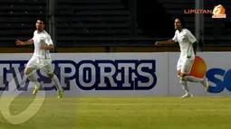 Hammadi Ahmed Abdullah (Irak - 7) melakukan selebrasi usai mencetak gol ke gawang Indonesia dalam laga kualifikasi Piala Asia 2015 (Liputan6.com/Helmi Fithriansyah)