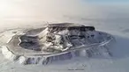 Foto dari udara yang diabadikan pada 28 November 2020 ini menunjukkan pemandangan gunung berapi yang berselimut salju di Ulanqab, Daerah Otonom Mongolia Dalam, China utara. (Xinhua/Wang Zheng)