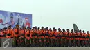 Prajurit Kopaskhas TNI AU berjalan menuju lokasi upacara peringatan Hari Ulang Tahun ke-69 TNI AU di Pangkalan Udara Halim Perdanakusuma, Jakarta, Kamis (9/4). Sejumlah atraksi ditampilkan oleh prajurit TNI AU. (Liputan6.com/Johan Tallo)
