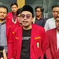 Ketum Ikatan Mahasiswa Muhammadiyah (IMM) DKI Jakarta Ari Aprian Harahap saat menagih tindak lanjut atas laporan terkait dugaan SARA dan pengancaman dari peneliti BRIN. (Liputan6.com//Ady Anugrahadi)