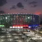 Foto udara memperilhatkan Jakarta International Stadium (JIS) yang baru didirikan untuk pertandingan sepak bola dan konser musik, di Jakarta pada 17 April 2022. Stadion termegah di Indonesia tersebut mampu menampung 82.000 penonton. (ADEK BERRY/AFP)