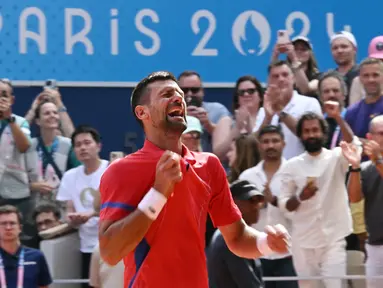 Novak Djokovic telah menamatkan tenis. Medali emas Olimpiade 2024 jadi kepingan terakhir yang membawa Djokovic melengkapi Golden Slam. (AFP/Carl De Souza)