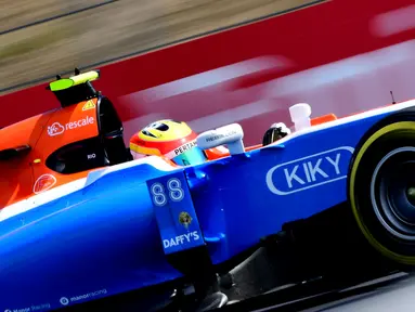 Rio Haryanto finis ke-21 F1 GP Hungaria di Sirkuit Hungaroring, Budapest, Minggu (24/7/2016). Lewis Hamilton menjadi juara. (AFP/Attila Kisbenedek)