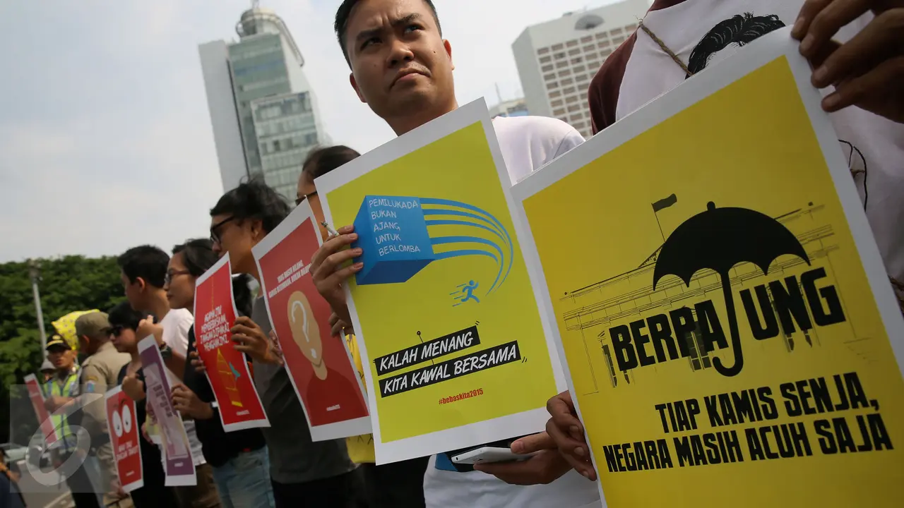 20151210- Aksi Peringati Hari HAM di Bundaran HI-Jakarta-Faizal Fanani