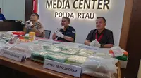 Puluhan kilogram sabu dan ratusan ribu butir pil ekstasi sitaan Polda Riau selama Operasi Anti Narkoba. (Liputan6.com/M Syukur)