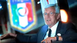 Coach of the Italian national football team Marcello Lippi watches after his team arriving at Sofia airport on October 10, 2008, ahead of Saturday's World Cup qualifier against Bulgaria. AFP PHOTO / DIMITAR DILKOFF