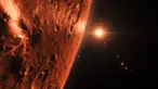 Tampilan di atas permukaan salah satu planet dalam sistem Trappist-1 yang dirilis oleh NASA, Washington, AS, Rabu (22/2). Para astronom menemukan sistem bintang yang dekat dengan sistem tata surya. (AFP PHOTO / M. Kornmesser)