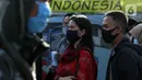 Calon penumpang KRL Commuterline mengenakan masker saat di area pedestrian Stasiun Terpadu Tanah Abang, Jakarta, Kamis (27/8/2020). Guna menekan penyebaran Covid-19, aparat terkait terus menghimbau pentingnya menaati protokol kesehatan. (Liputan6.com/Helmi Fithriansyah)