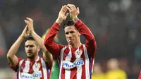 Fernando Torres menutup kemenangan Atletico Madrid atas Bayer Leverkusen dengan satu golnya, Atletico akhirnya menang 4-2 win pada babak 16 besar leg pertama Liga Champions di BayArena, Leverkusen, (21/2/2017). (AP/Martin Meissner)