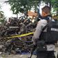 Tumpukan kendaraan yang hancur diterjang bom Surabaya (Merdeka.com/Ahda Bayhaqi)