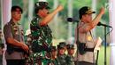 Panglima TNI Marsekal Hadi Tjahjanto dan Kapolri Jenderal Tito Karnavian memimpin Apel Kesiapan Natal, Tahun Baru 2019 serta menjelang Pemilu legislasi dan Presiden 2019 di lapangan silang Monas, Jakarta, Jumat (30/11). (Liputan6.com/Johan Tallo)