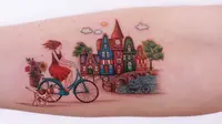 Seniman ini buat tato penuh warna bak di buku dongeng, hasilnya keren banget. (Sumber: Boredpanda)