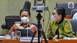 Menteri Kesehatan Budi Gunadi Sadikin (kiri) mengikuti rapat kerja dengan Komisi IX DPR di Kompleks Parlemen Senayan, Jakarta, Rabu (30/11/2022). Dalam raker tersebut membahas mengenai peningkatan capaian bulan Imunisasi Anak Sekolah (BIAS) dan Bulan Imunisasi Nasional (BIAN), program penguatan pelayanan kesehatan rujukan, serta penguatan pelayanan kesehatan primer melalui pemindaian dan revitalisasi fungsi puskesmas. (Liputan6.com/Angga Yuniar)