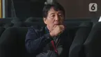 General Manager Hyundai Engineering Construction, Henry Jung menunggu jalannya pemeriksaan di gedung KPK, Jakarta, Kamis (5/12/2019). Henry Jung diperiksa sebagai tersangka dugaan suap proses perizinan proyek Pembangkit Listrik Tenaga Uap (PLTU) 2 Cirebon. (merdeka.com/Dwi Narwoko)