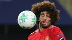 Mimik wajah gelandang Manchester United (MU), Marouane Fellaini saat terkena benturan bola dalam laga Piala Super Eropa melawan Real Madrid di Macedonia, Selasa (8/8). Foto wajah Fellaini yang menjadi aneh itu viral di media sosial. (AP/Boris Grdanoski)