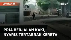 Aksi mengerikan dilakukan oleh seorang pria saat menyeberangi rel saat kereta api melintas