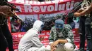 Aksi Tersebut sebagai kecaman kepada China terkait umat Muslim di China dilarang berpuasa oleh pemerintah setempat dan terancam ditangkap jika ketahuan. (Liputan6.com/Faizal Fanani)