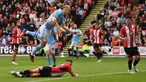 Pemain Manchester City Erling Haaland mencoba mencetak gol ke gawang Sheffield United pada pertandingan sepak bola Liga Inggris di Bramall Lane, Sheffield, Inggris, Minggu (27/8/2023). Manchester City mengalahkan Sheffield United dengan skor 2-1. (AP Photo/Rui Vieira)