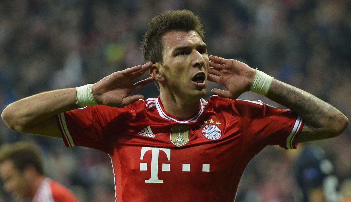 Pesepak bola asal Kroasia, Mario Mandzukic memutuskan pensiun sebagai pemain pada 4 September 2021 lalu. Total 17 tahun telah dihabiskan striker jangkung berusia 35 tahun ini dalam 9 klub yang pernah dibelanya. Berikut sepak terjang Mandzukic di 9 klub tersebut. (Foto: AFP/Odd Andersen)