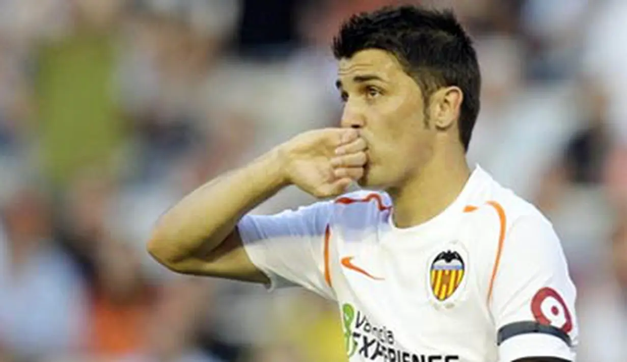 Valencia's David Villa celebrates his goal during their Spanish league football match at Mestalla Stadium in Valencia, on May 30, 2009. AFP PHOTO/DIEGO TUSON