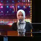 Penyanyi asal Indonesia Putri Ariani menjadi sorotan publik setelah tampil di America&rsquo;s Got Talent dan mendapatkan Golden Buzzer. (Foto: tangkapan layar Twitter America's Got Talent/AGT)