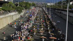 Festival yang dikenal dengan nama Silleteros Parade ini telah dilangsungkan sejak 1957. (AFP/Fredy Builes)