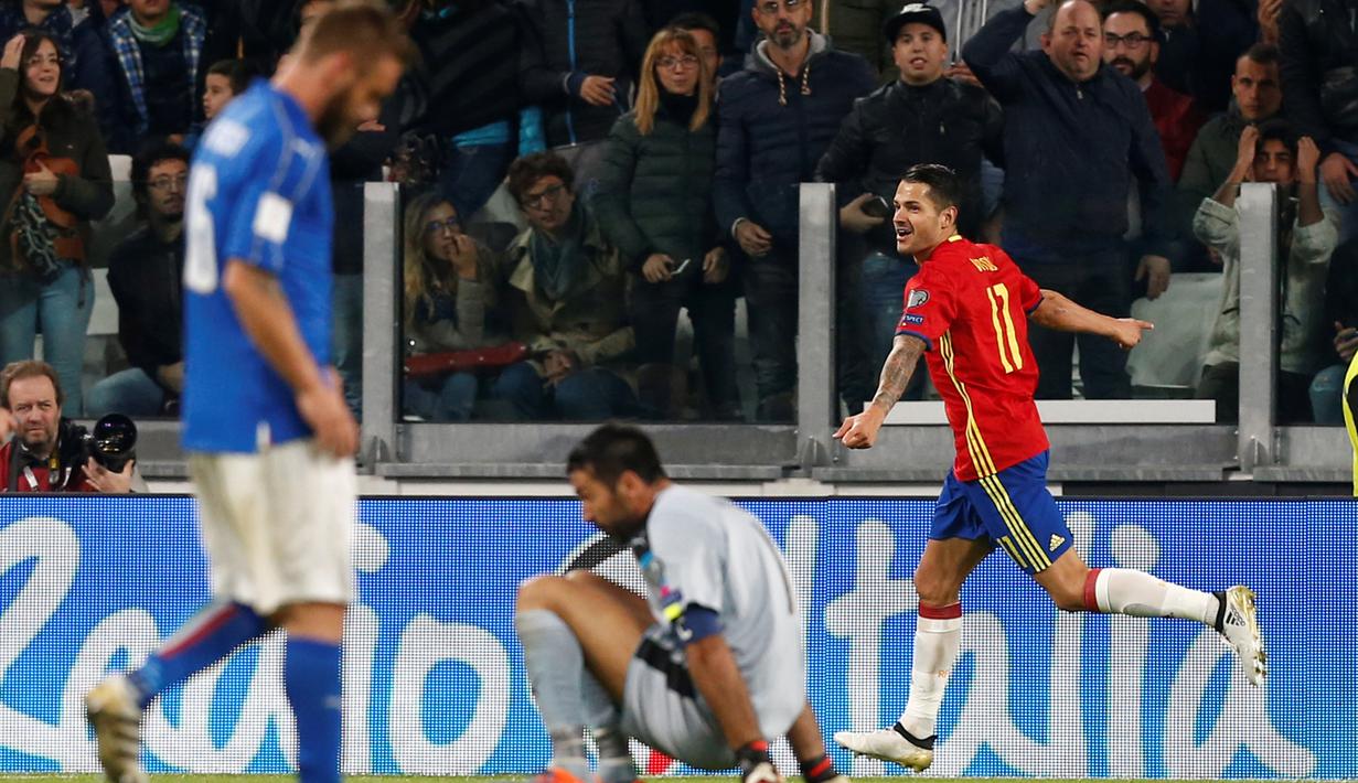 Ekspresi gelandang Spanyol, Vitolo, setelah menjebol gawang Italia dalam laga Grup G kualifikasi Piala Dunia 2018 di Juventus Stadium, Jumat (7/10/2016) dini hari WIB. (AFP/Marco Bertorello)