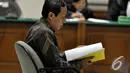 Tafsir Nurchamid bersiap-siap menjalani sidang lanjutan di Pengadilan Tipikor, Jakarta, Rabu (19/11/2014). (Liputan6.com/Miftahul Hayat)