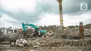 Alat berat terlihat di lokasi pembangunan Kampung Susun Akuarium di Jakarta, Rabu (17/2/2021). Progres pembangunan Kampung Susun Akuarium tersebut telah mencapai 30 persen dan ditargetkan rampung pada Agustus 2021 mendatang. (Liputan6.com/Faizal Fanani)