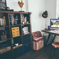 Ilustrasi ruang kerja dengan brankas Photo by Vadim Sherbakov on Unsplash