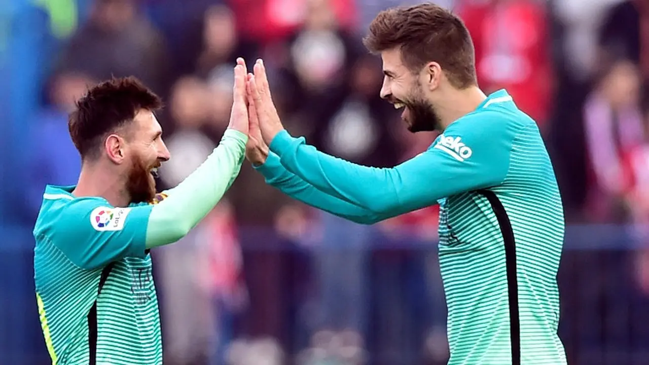 Lionel Messi dan Gerard Pique
