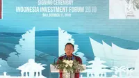 Menko Perekonomian Darmin Nasution berpidato usai menyaksikan penandatanganan kerja sama Indonesia Investment Forum 2018, Bali, Kamis (11/10). Kerja sama juga menerbitkan Kontrak Investasi Kolektif Dana Investasi Infrastruktur. (Liputan6.com/Angga Yuniar)