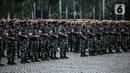Prajurit TNI AD mengikuti Apel Gelar Pasukan Jajaran TNI AD di Lapangan Monas, Jakarta, Selasa (25/1/2022). Pasukan TNI AD dan Alutsista dipamerkan saat mengikuti gelar apel pasukan. (Liputan6.com/Faizal Fanani)